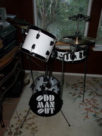 I got those long riser tubes off E-bay. I fabricated the spurs from mild steel rods and used the plastic feet that came on my original floor tom legs. (I use different legs for my vertical-orientation cocktail set-up.)